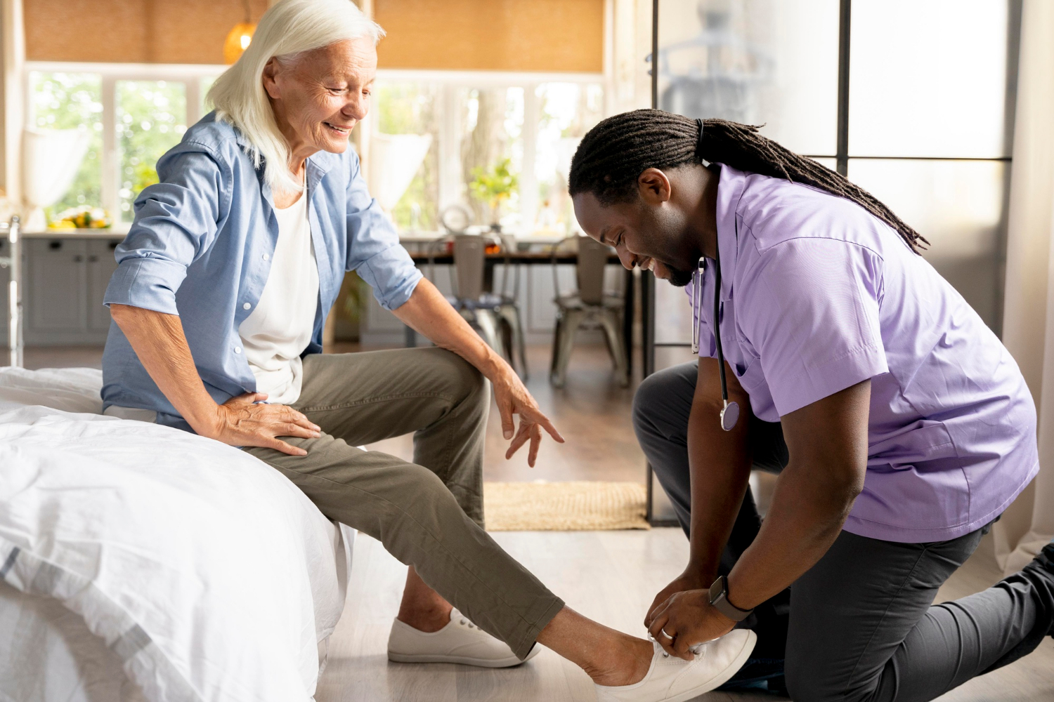 Nurse assisting elderly patient
